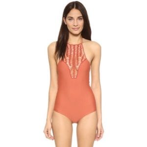 Teahupo’o one piece in papaya size small